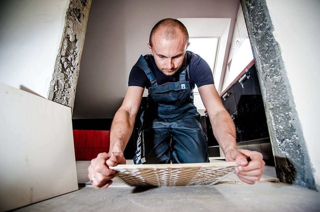 Picture of commercial tiler at work